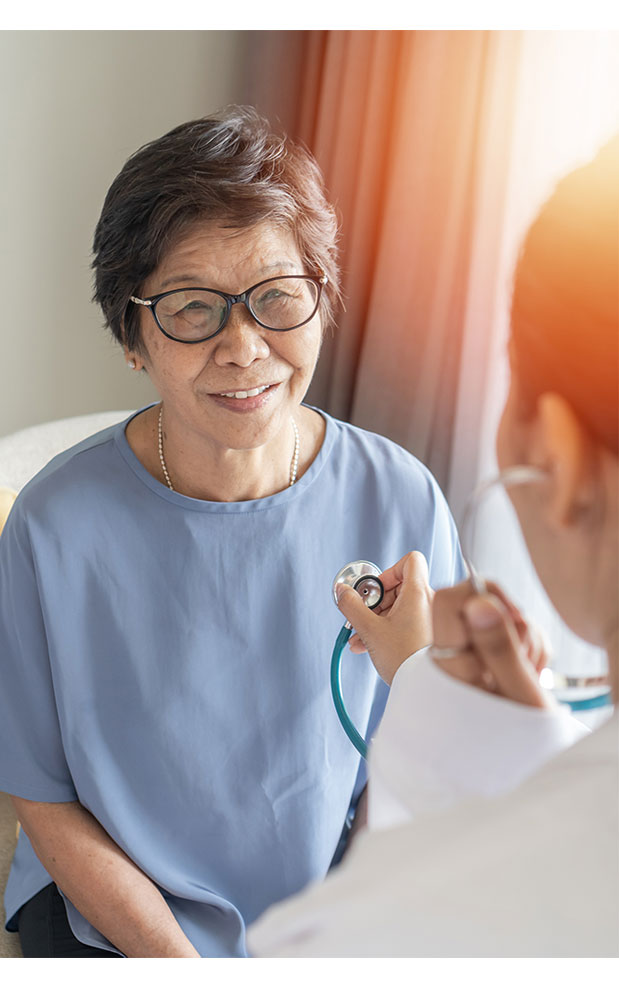 Elderly patient at heart checkup with physician