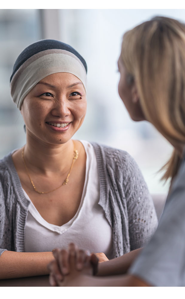 Woman patient at Cancer care checkup with physician