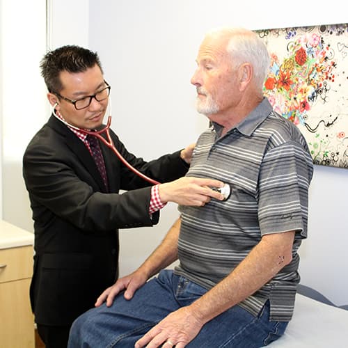 Larry Chan, DO with his patient Chuck Miller